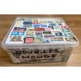 Lot de timbres monde collectionnés depuis de nombreuses années oblitérés et décollés